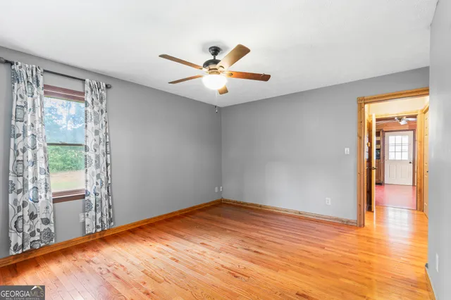 a view of a swimming pool with an outdoor space and seating area