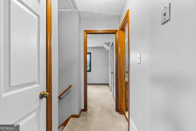 a view of a swimming pool with an outdoor space and seating area