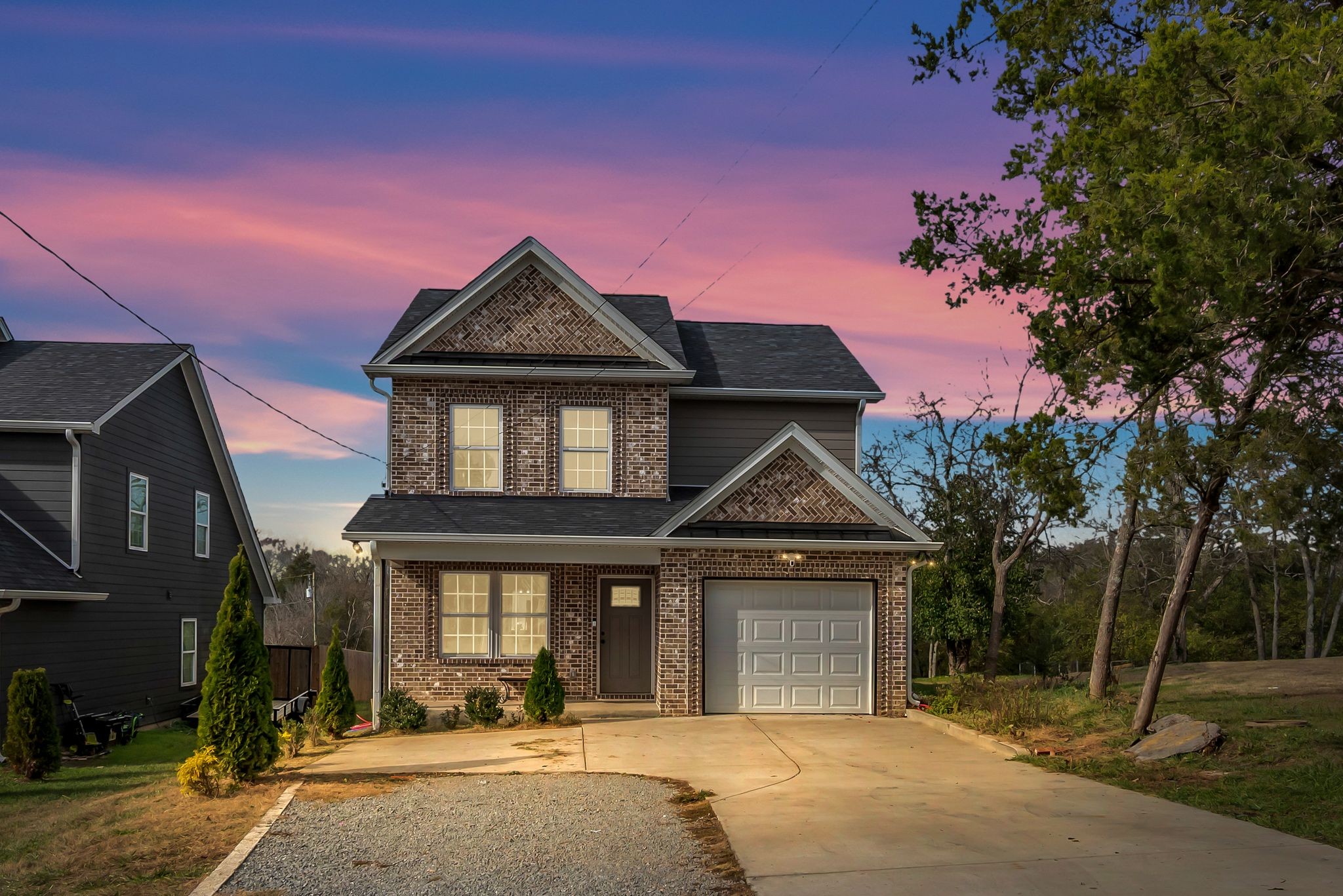 412 Larkin Springs Road Madison, TN 37115 - Photo 29 of 29 a front view of a house with a garden