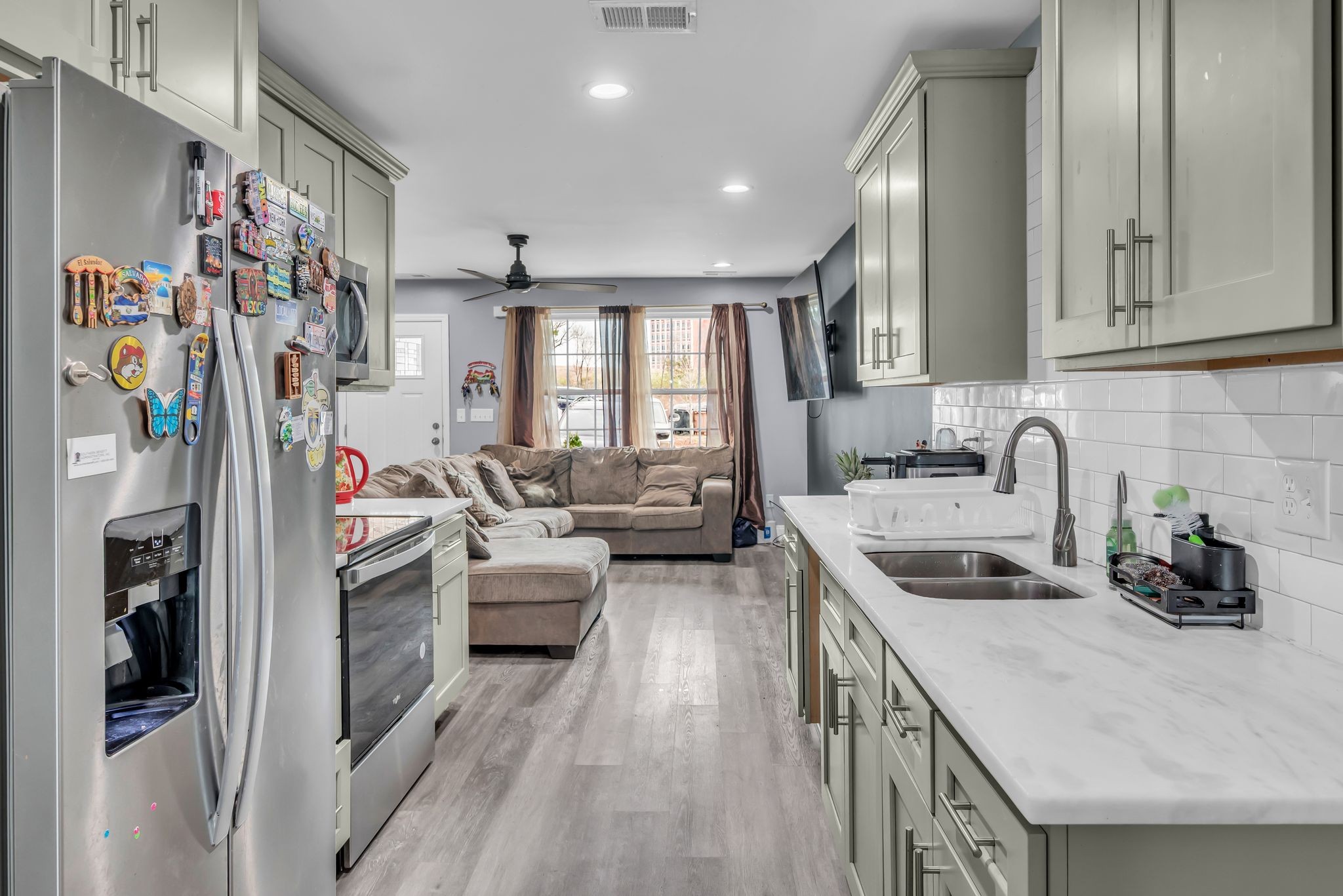 412 Larkin Springs Road Madison, TN 37115 - Photo 10 of 29 a kitchen that has a lot of cabinets a sink and appliances