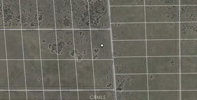 a bathroom with a shower and a glass door shower