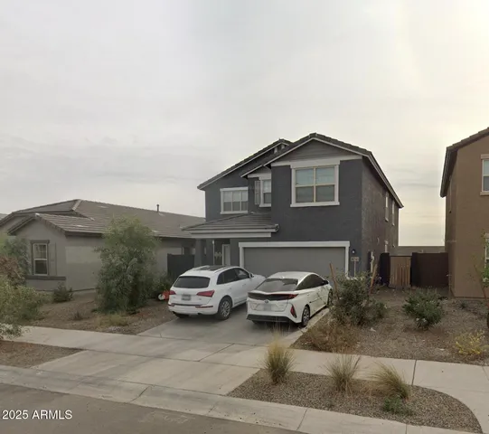 a car parked in front of a house
