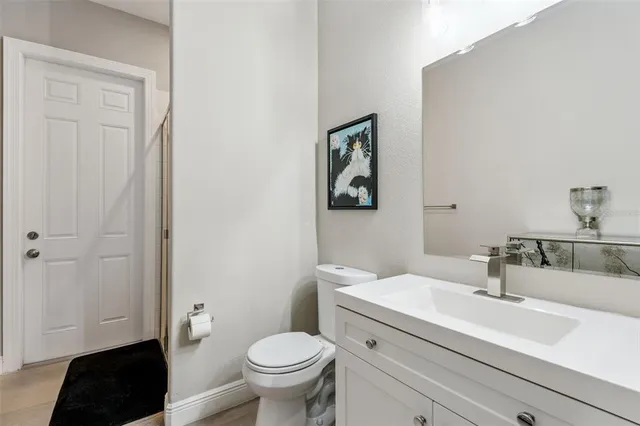 a bathroom with a sink and a toilet