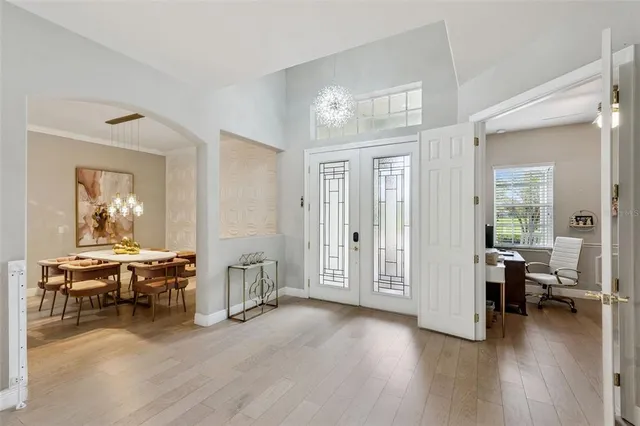 a view of a livingroom with furniture and hardwood floor