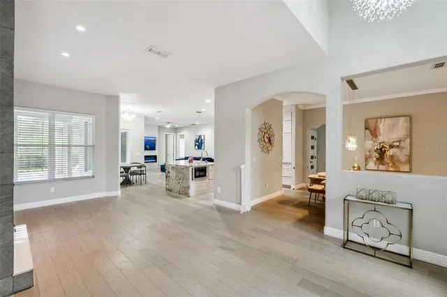 a view of a livingroom with furniture and a window