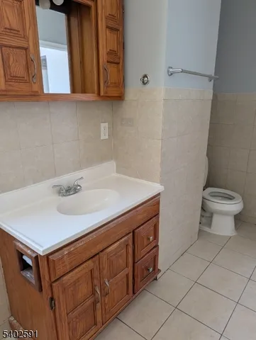 a bathroom with a sink and a toilet