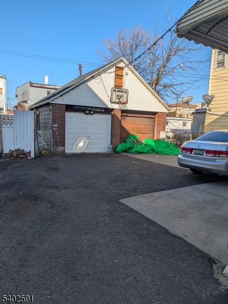 313 Palmer Street Elizabeth, NJ 07202 - Photo 14 of 15 a view of a house with a yard