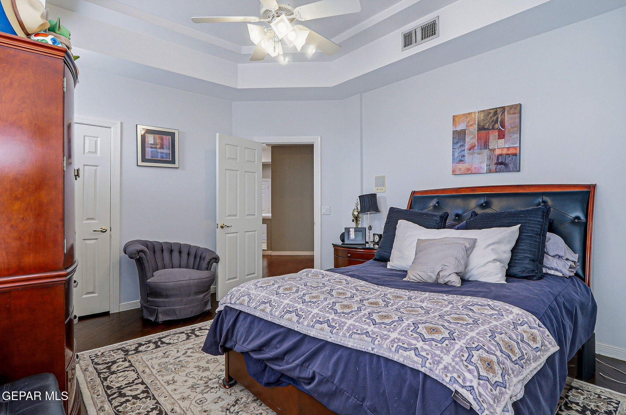 5806 Diamond Point Circle El Paso, TX 79912 - Photo 39 of 61 a bedroom with a bed and a couch