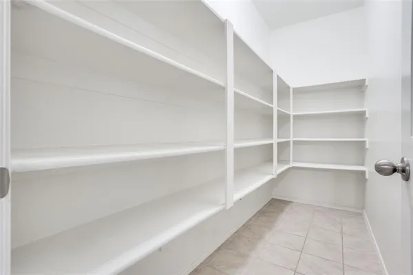 a view of a room with shelves