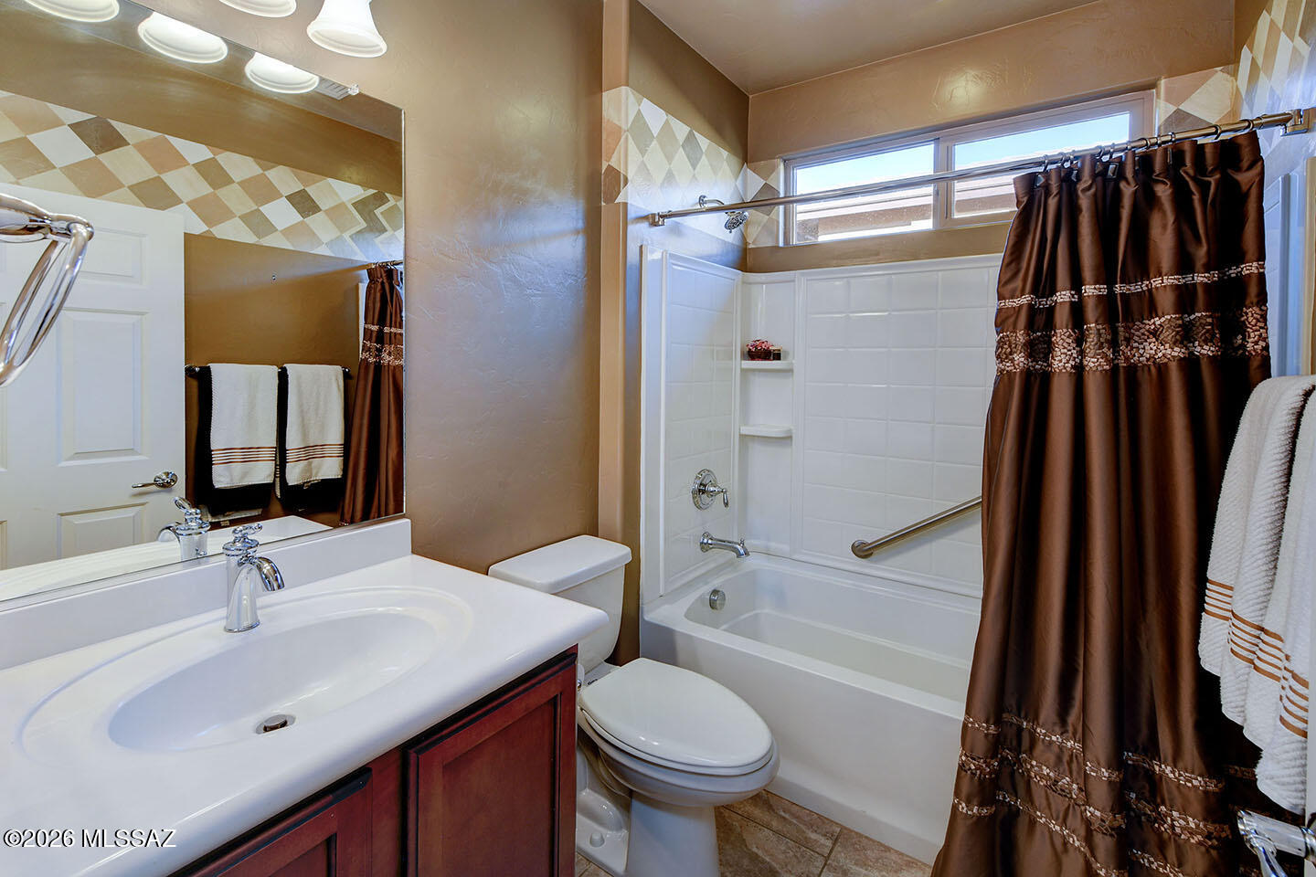 13991 East Cheavront Loop Vail, AZ 85641 - Photo 24 of 47 a bathroom with a sink toilet and shower