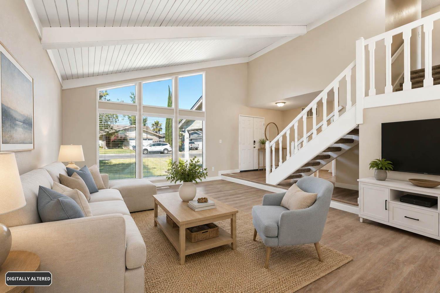 5501 Riverlake Road Discovery Bay, CA 94505 - Photo 9 of 60 a living room with furniture windows and a flat screen tv