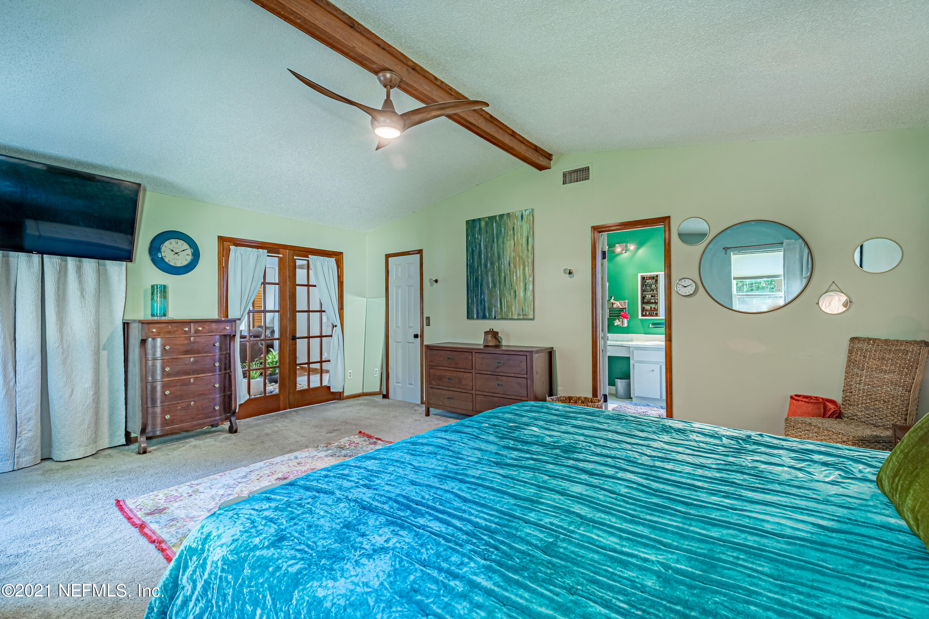 12825 Ridgemore Lane Jacksonville, FL 32258 - Photo 20 of 37 a bedroom with a bed and dresser