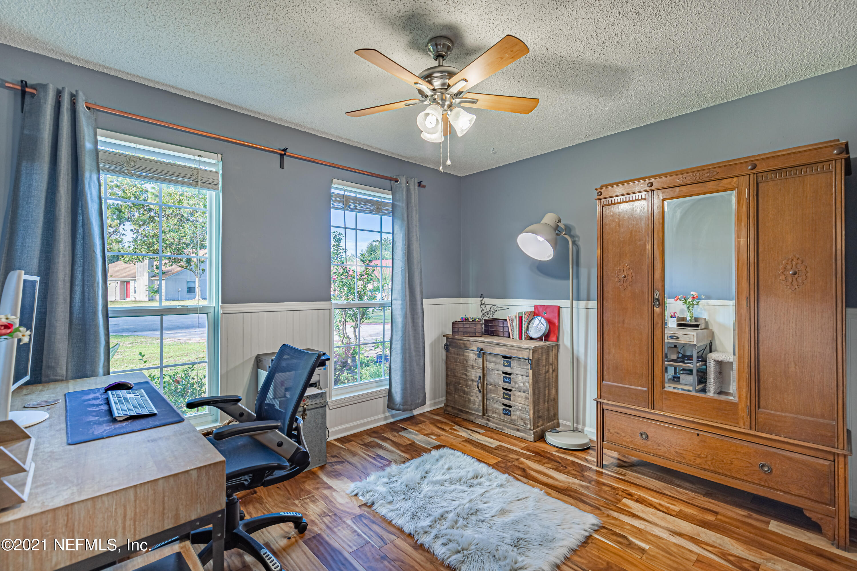 12825 Ridgemore Lane Jacksonville, FL 32258 - Photo 25 of 37 a room with furniture and a window