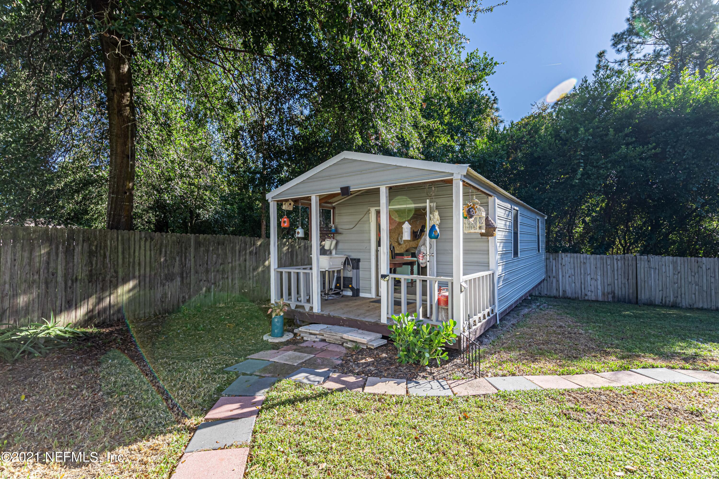 12825 Ridgemore Lane Jacksonville, FL 32258 - Photo 30 of 37 a front view of a house with garden