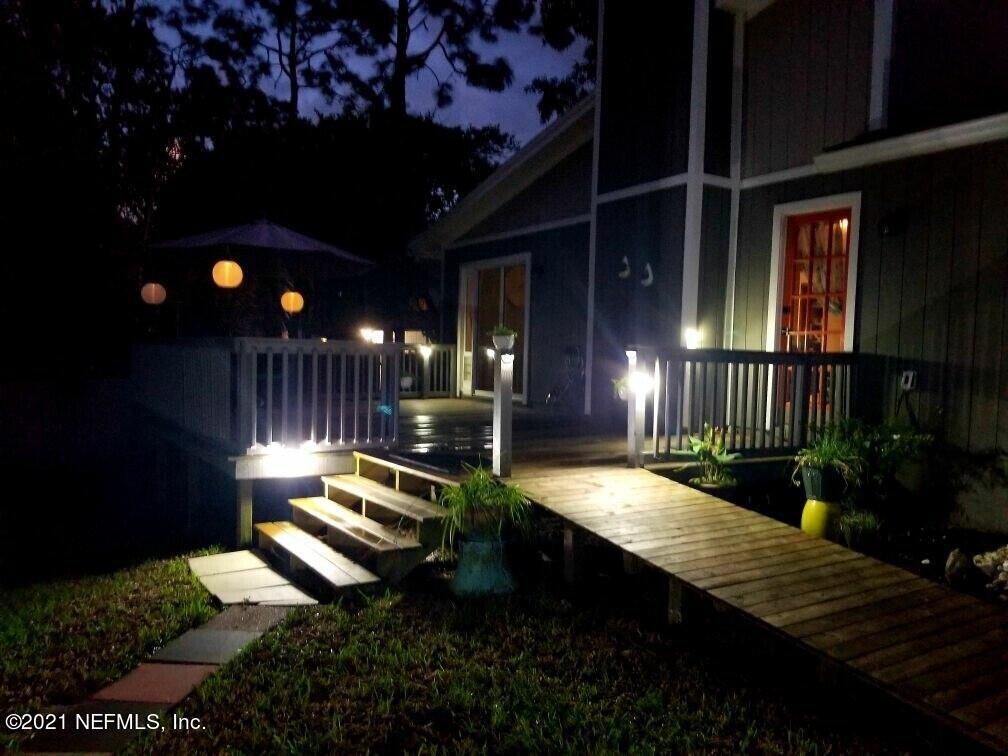 12825 Ridgemore Lane Jacksonville, FL 32258 - Photo 36 of 37 a view of a house with backyard porch and sitting area