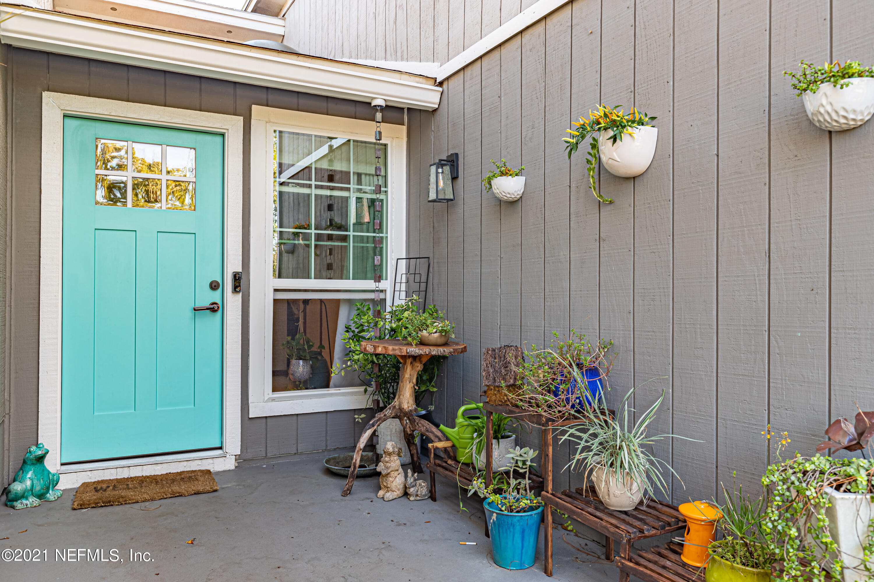 12825 Ridgemore Lane Jacksonville, FL 32258 - Photo 4 of 37 a front view of a house with seating space