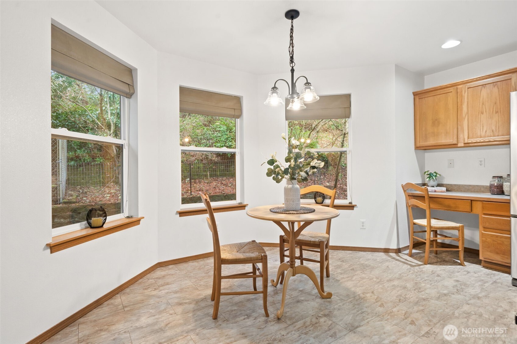 514 Southwest Hipkins Court Port Orchard, WA 98367 - Photo 13 of 39 a view of a dining room with furniture window and outside view