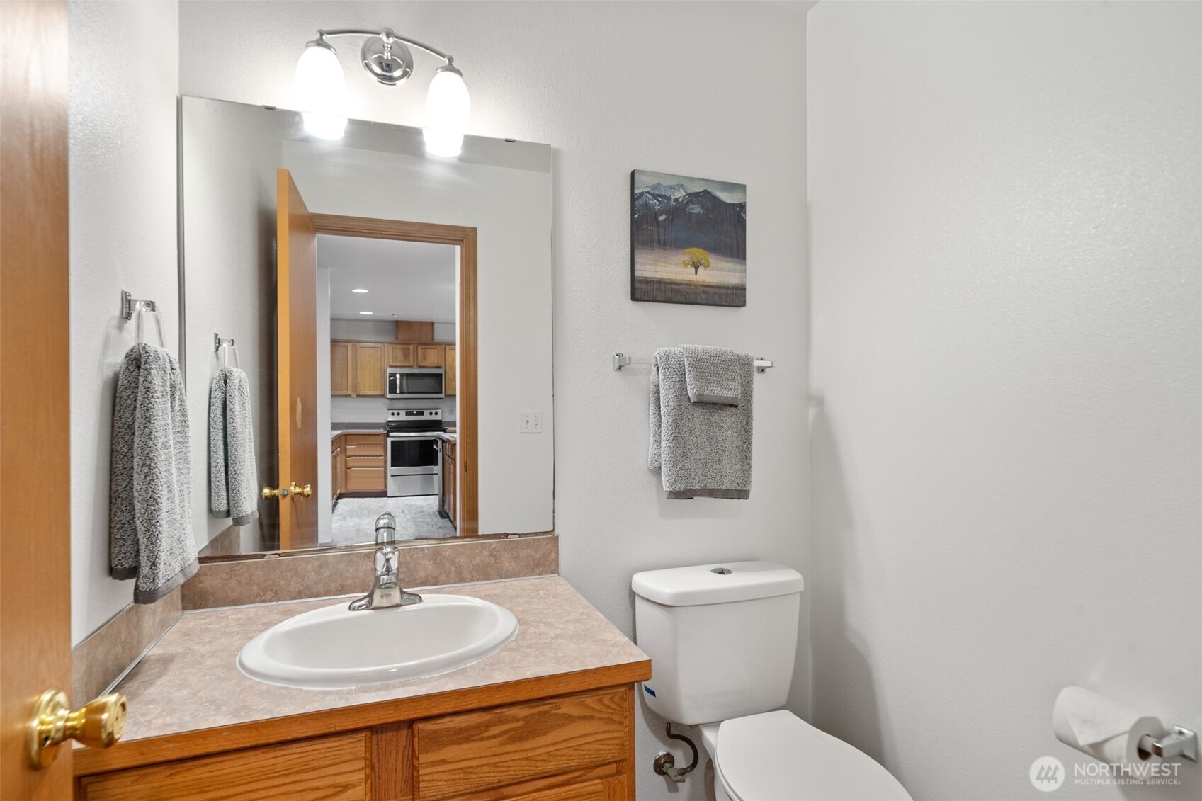 514 Southwest Hipkins Court Port Orchard, WA 98367 - Photo 22 of 39 a bathroom with a sink toilet and shower