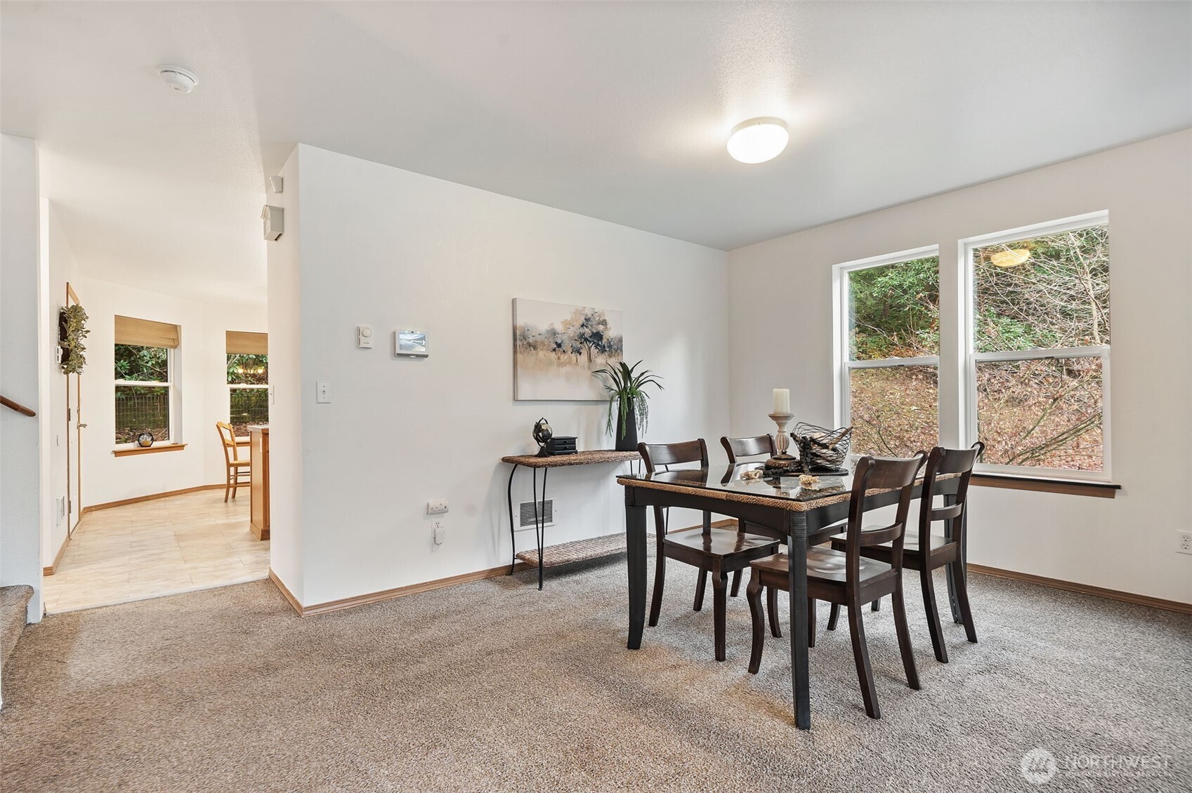 514 Southwest Hipkins Court Port Orchard, WA 98367 - Photo 7 of 39 a view of a dining room with furniture and window
