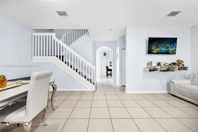 a view of an empty room and workspace
