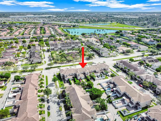 a view of a city with a lake