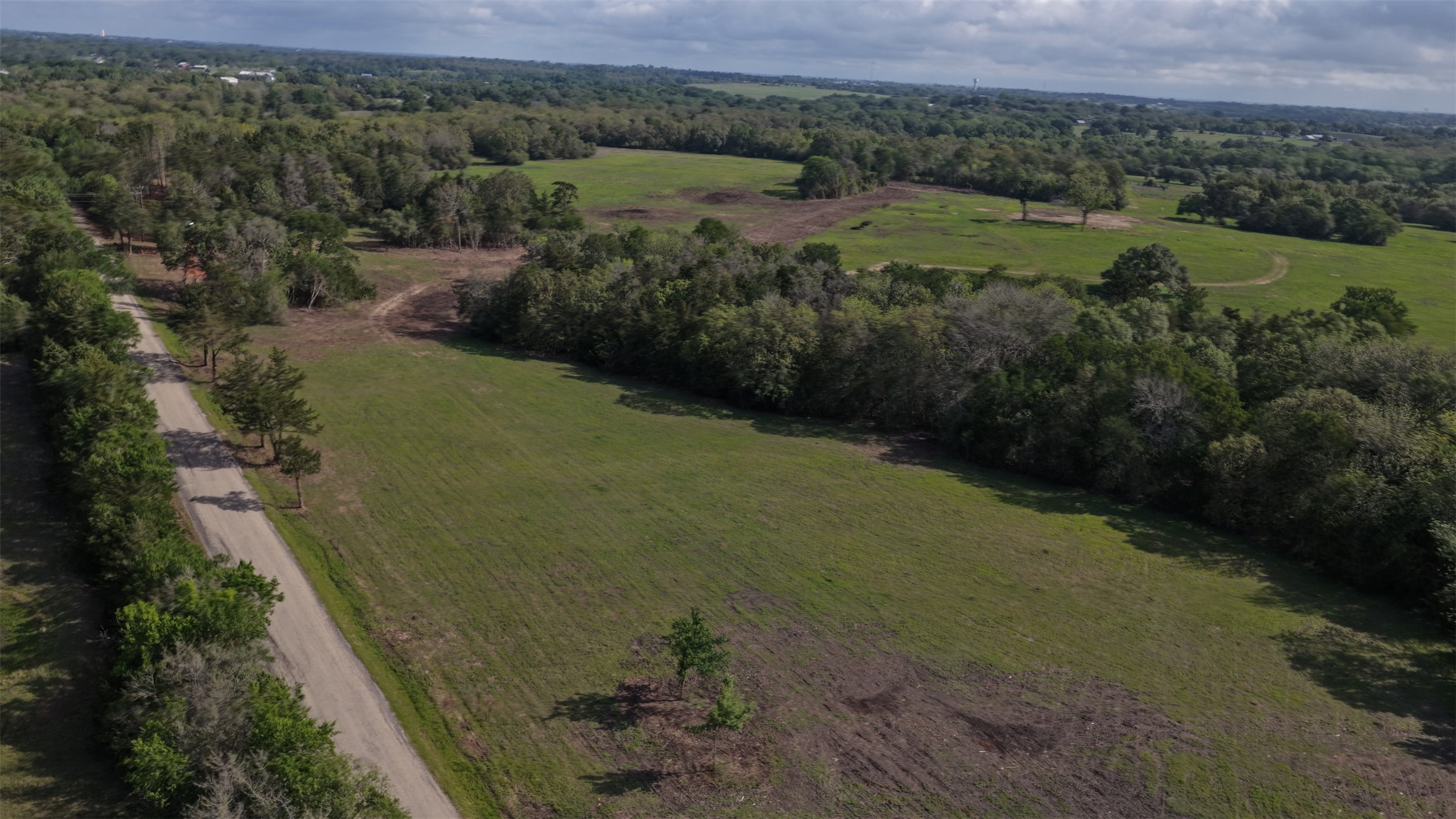 2 Baranowski Road Brenham, TX 77833 - Photo 2 of 7 an aerial view of a house with a yard
