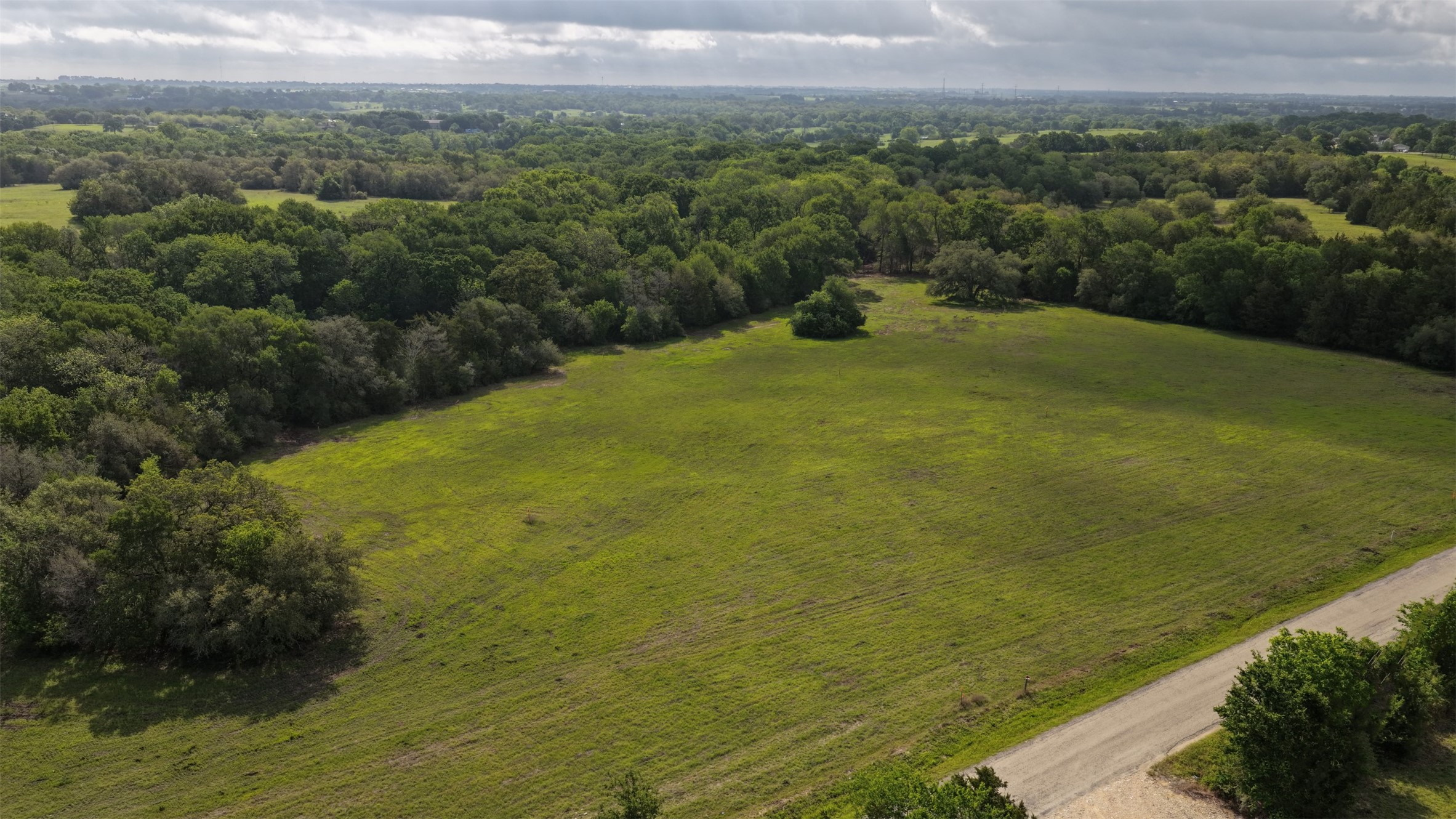2 Baranowski Road Brenham, TX 77833 - Photo 3 of 7 a view of a lake with a city
