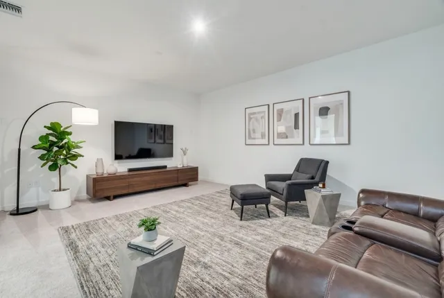 a view of a workspace with furniture