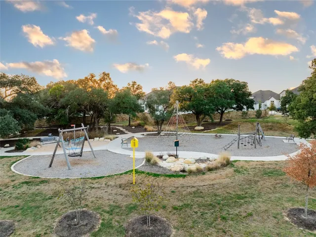 a view of a swimming pool with seating area