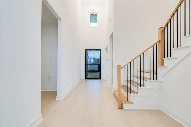 a view of a hallway with entryway