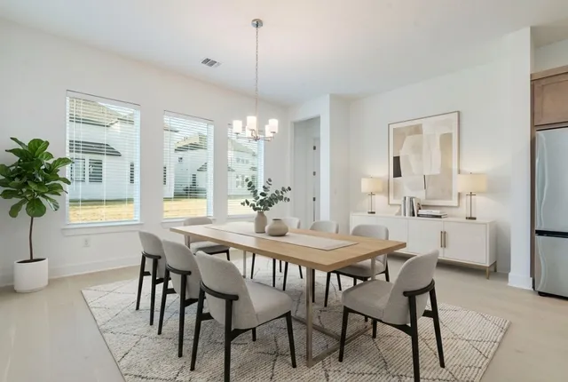 a kitchen with granite countertop a sink and cabinets
