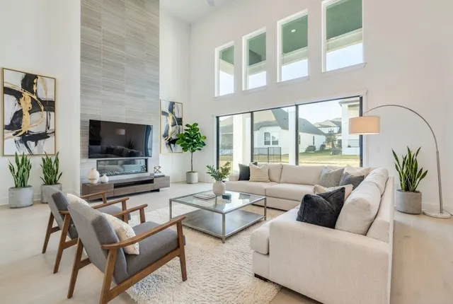 a view of a dining room with furniture and window