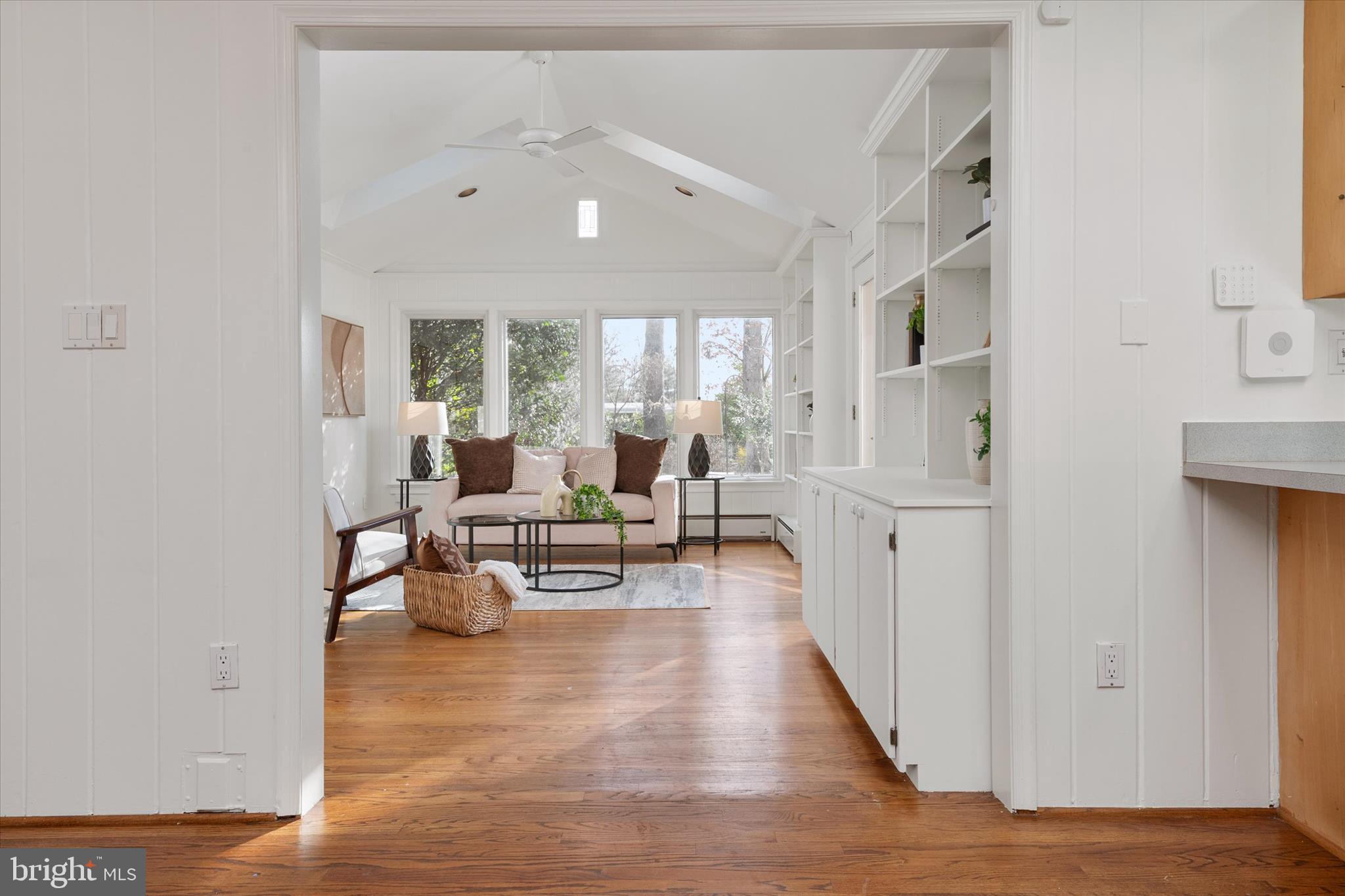 2100 Hermitage Avenue Silver Spring, MD 20902 - Photo 13 of 39 a living room with furniture and a large window