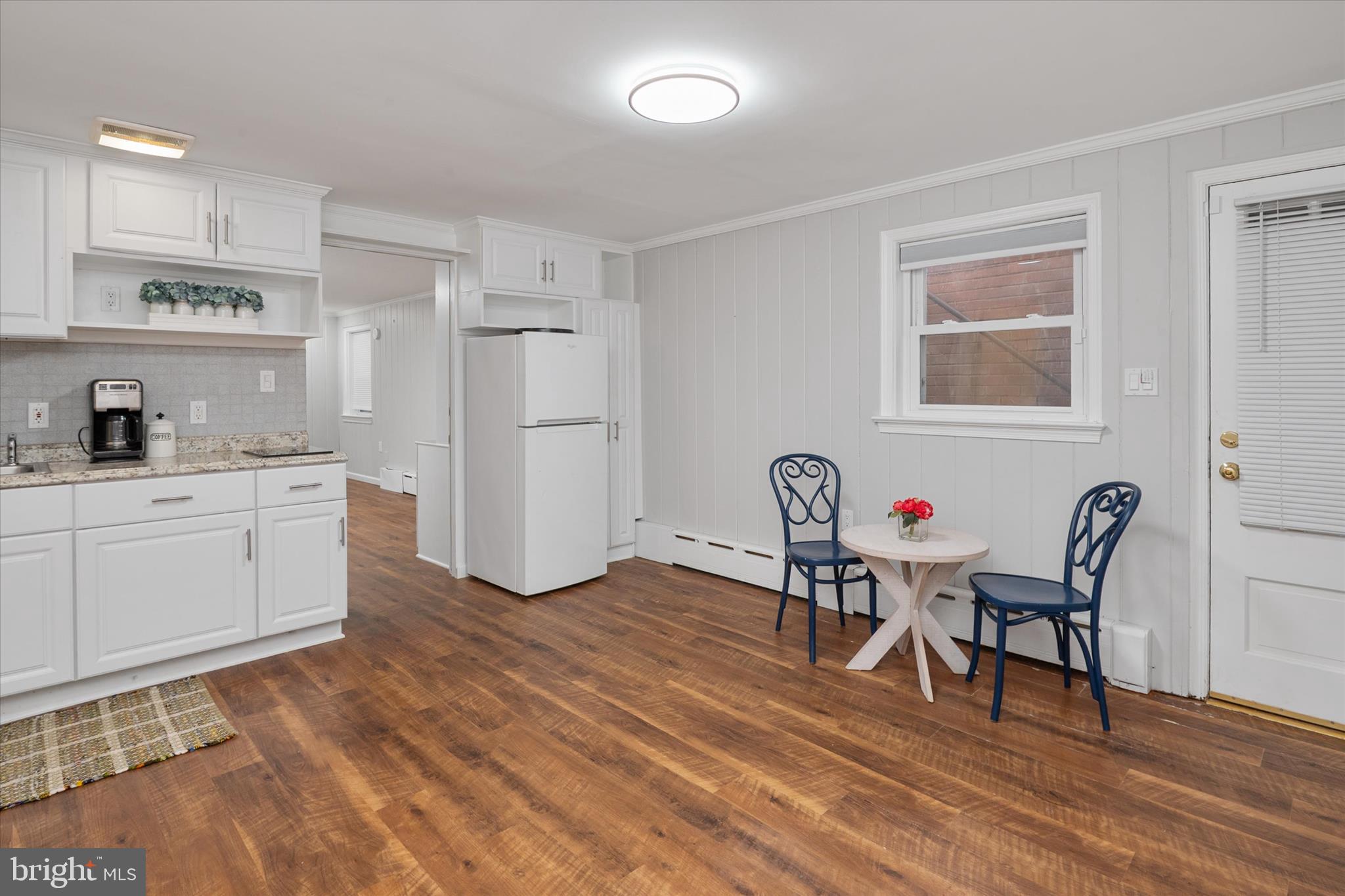 2100 Hermitage Avenue Silver Spring, MD 20902 - Photo 22 of 39 a workspace with wooden floor