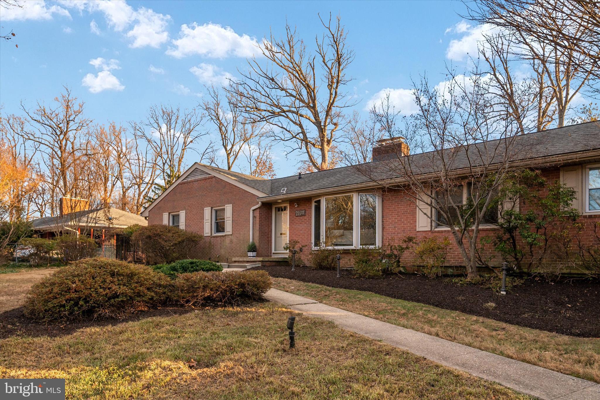 2100 Hermitage Avenue Silver Spring, MD 20902 - Photo 28 of 39 a front view of a house with garden