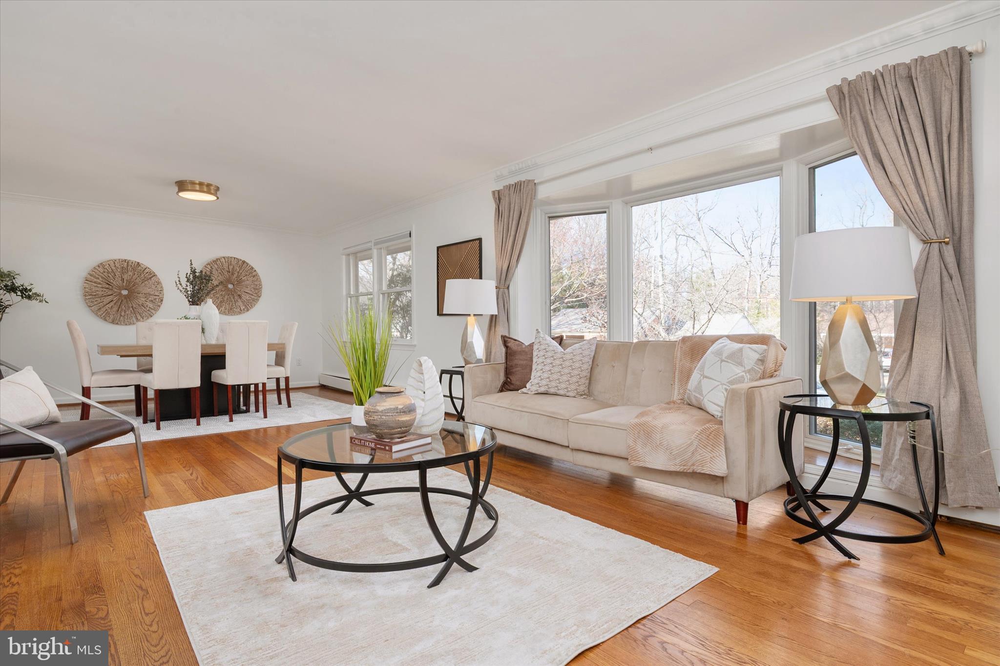 2100 Hermitage Avenue Silver Spring, MD 20902 - Photo 3 of 39 a living room with furniture and a large window
