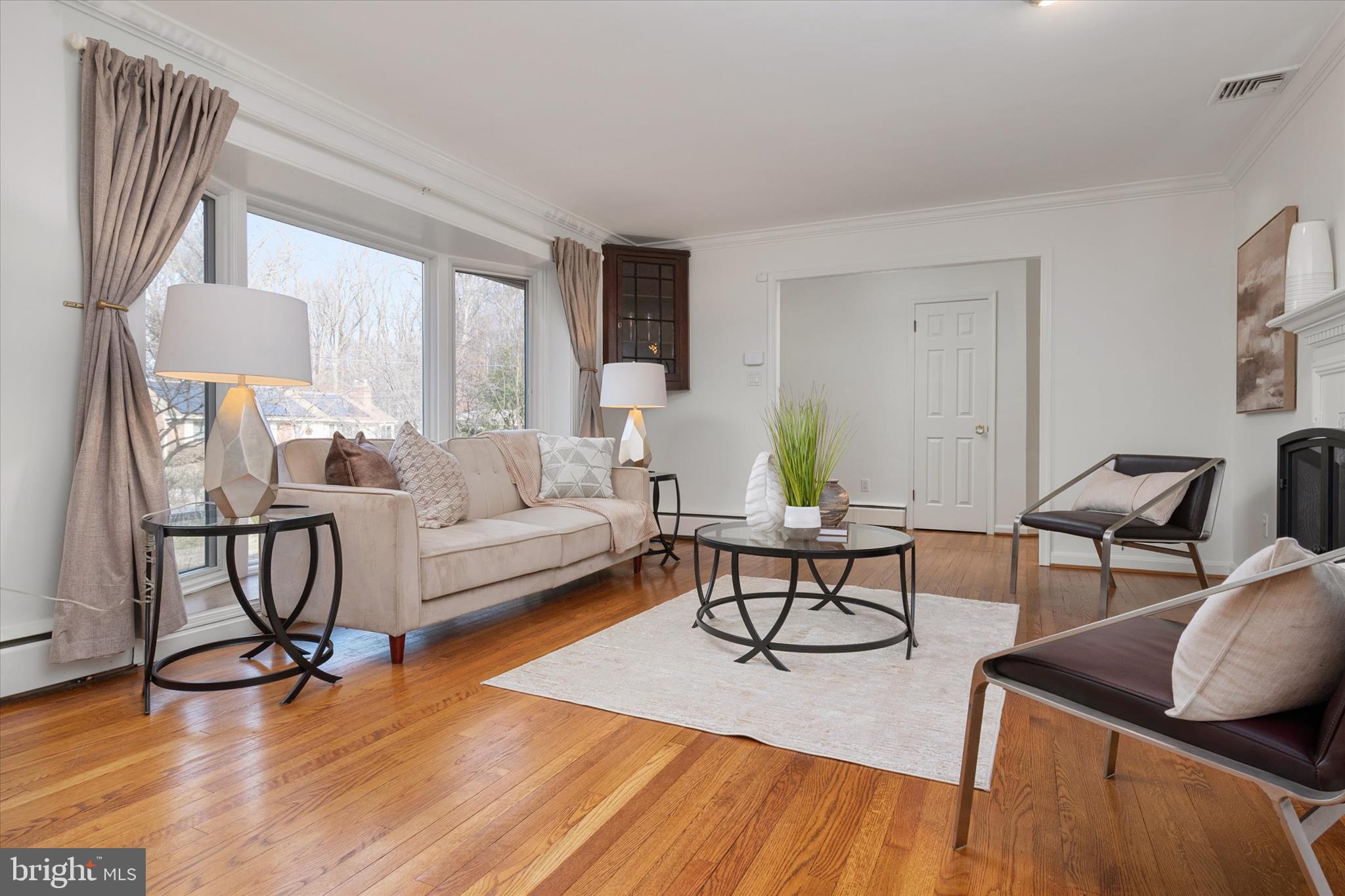 2100 Hermitage Avenue Silver Spring, MD 20902 - Photo 5 of 39 a living room with furniture and a wooden floor