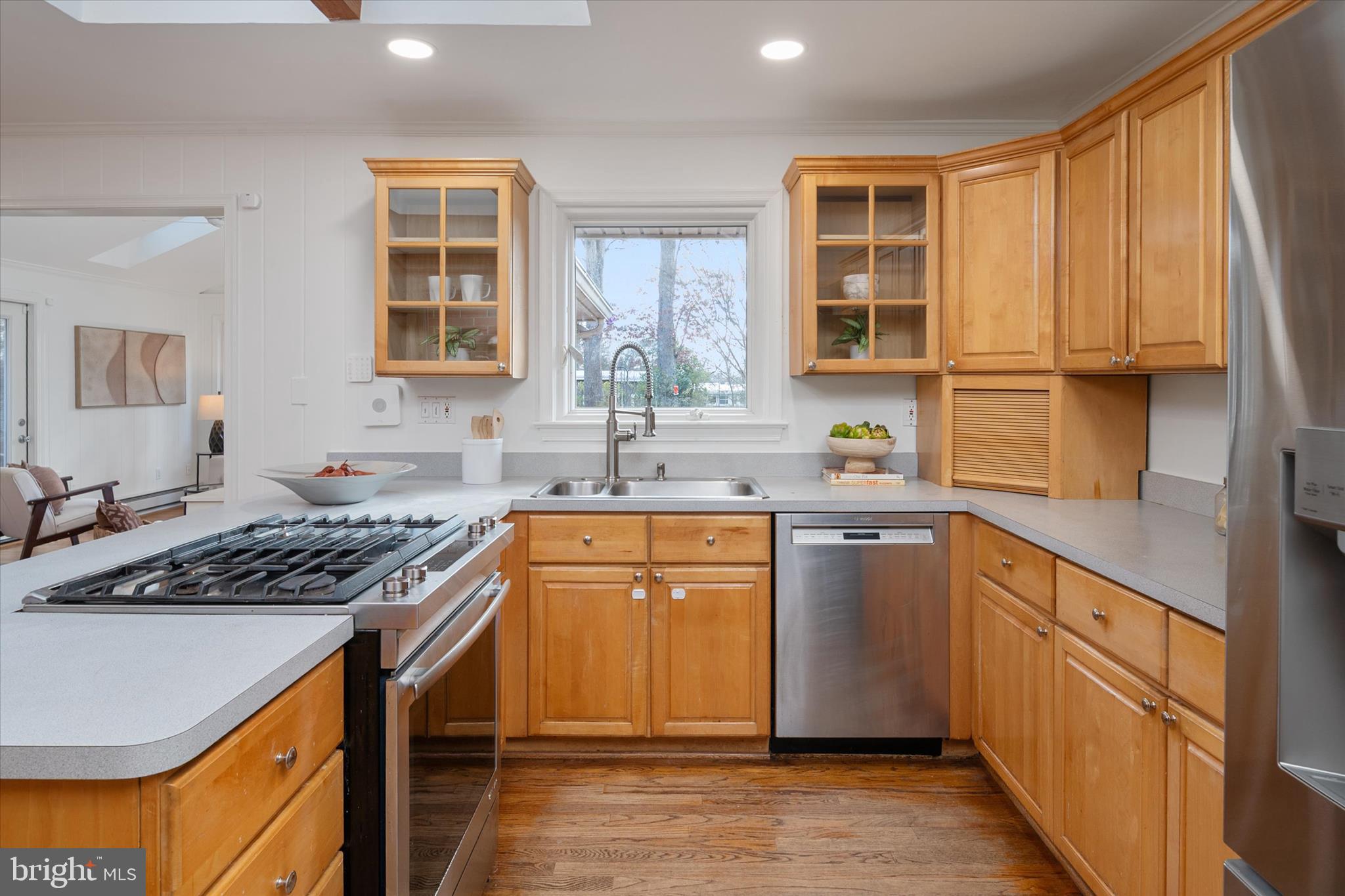 2100 Hermitage Avenue Silver Spring, MD 20902 - Photo 8 of 39 a kitchen with stainless steel appliances granite countertop a sink stove and refrigerator