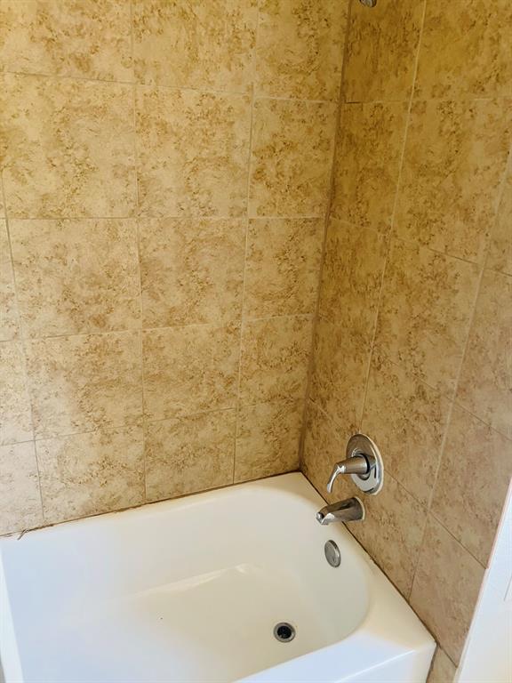 6320 Midway Road, Unit B Springtown, TX 76082 - Photo 11 of 19 Bathroom featuring shower / washtub combination