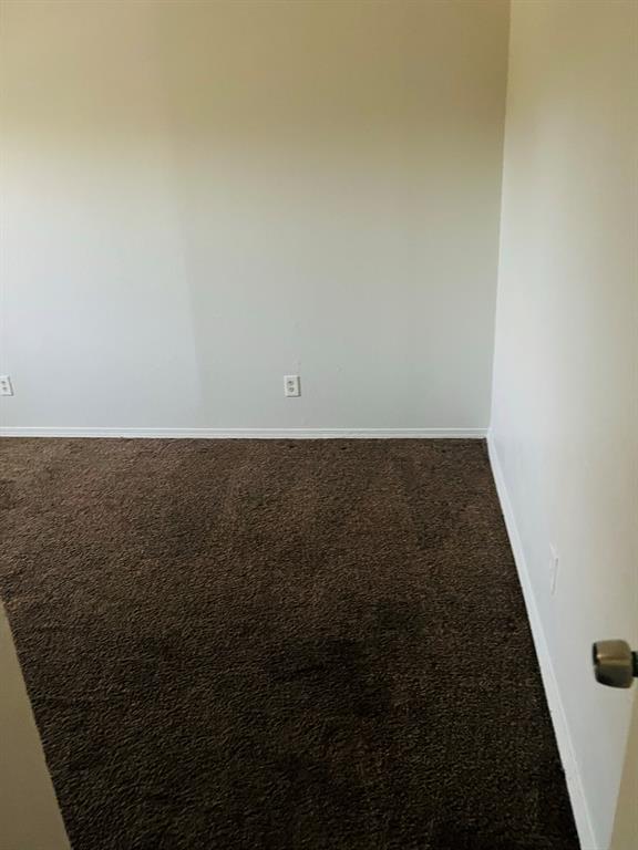 6320 Midway Road, Unit B Springtown, TX 76082 - Photo 14 of 19 Carpeted empty room with baseboards