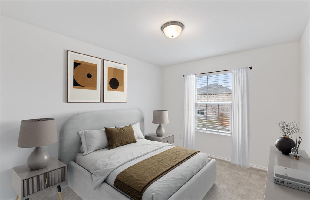7502 Fenton Parkway Pilot Point, TX 76258 - Photo 5 of 10 Spacious bedroom with large windows *Model Representation*