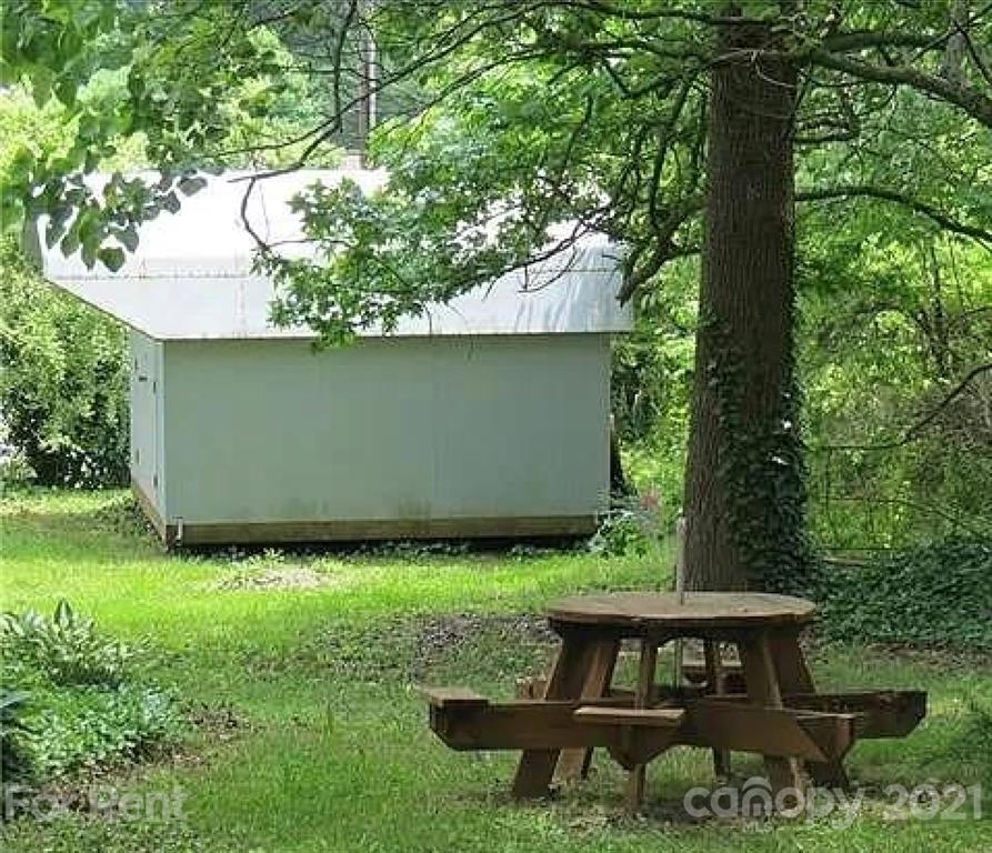 385 James Street Clyde, NC 28721 - Photo 14 of 14 a view of a back yard