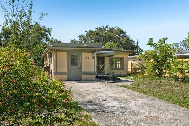 front view of a house with a yard