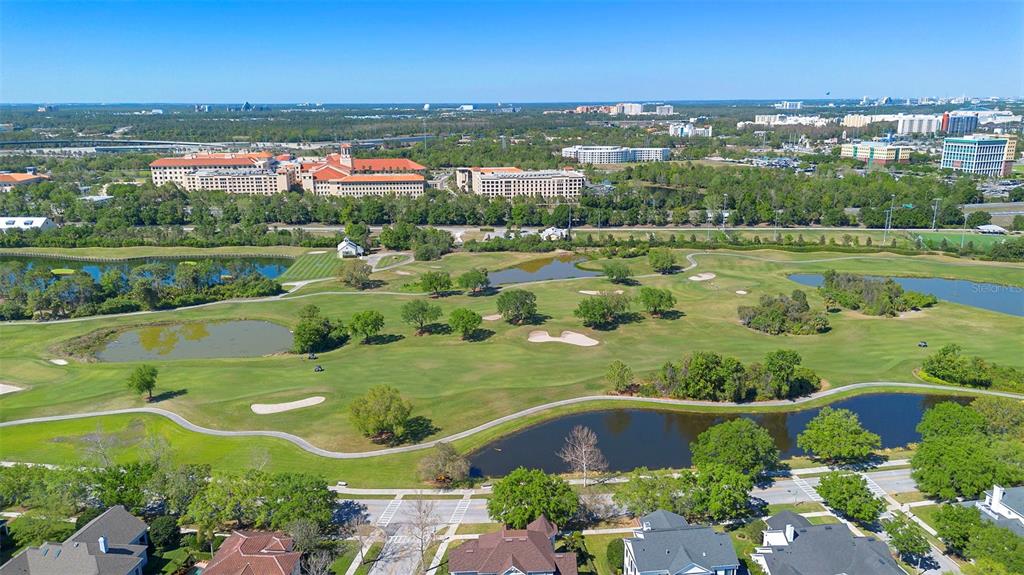 907 Pawstand Road Celebration, FL 34747 - Photo 49 of 49 an aerial view of a city with lots of residential buildings lake and ocean view