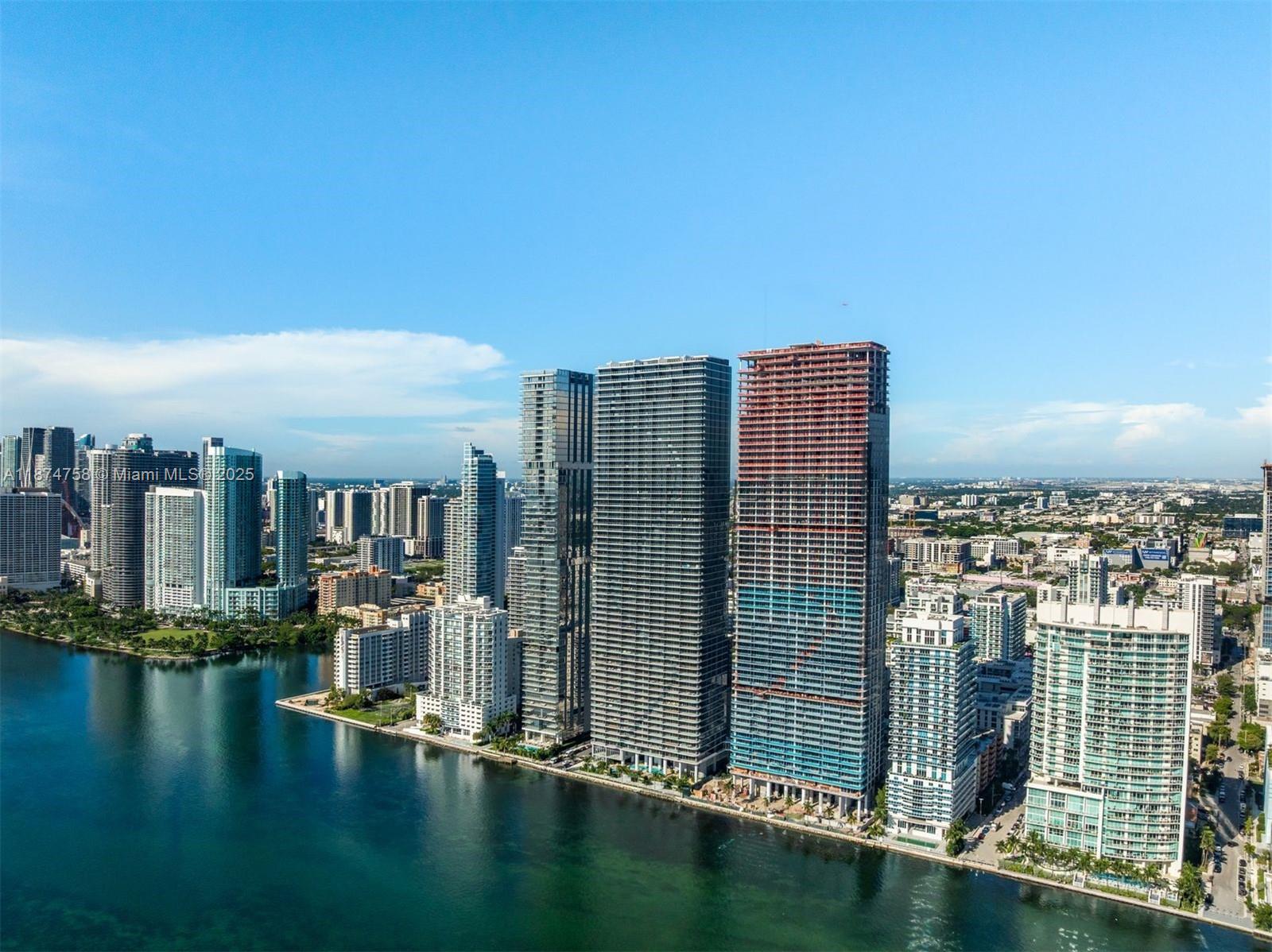 700 Northeast 24th Street, Unit 1005 Miami, FL 33137 - Photo 18 of 18 a view of building with lake view