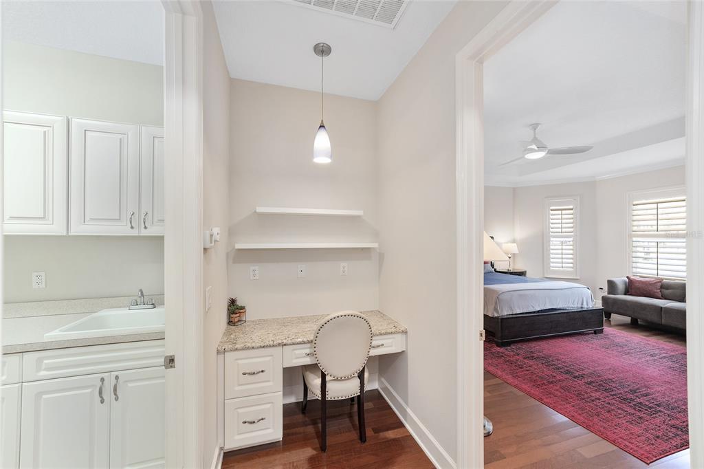 8942 Southwest 8th Street Ocala, FL 34481 - Photo 28 of 59 a view of a workspace with furniture and wooden floor