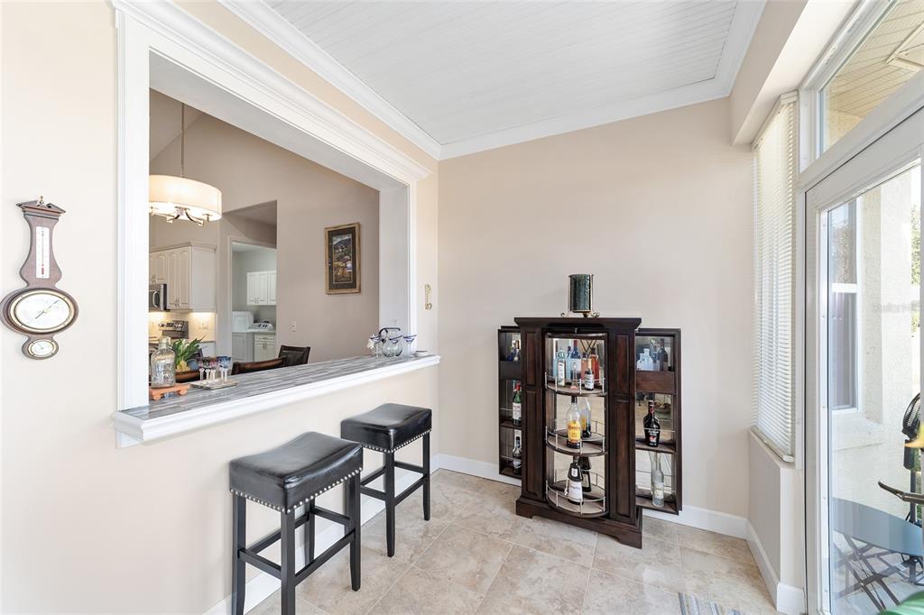 8942 Southwest 8th Street Ocala, FL 34481 - Photo 50 of 59 a dining room with a table and chairs in it