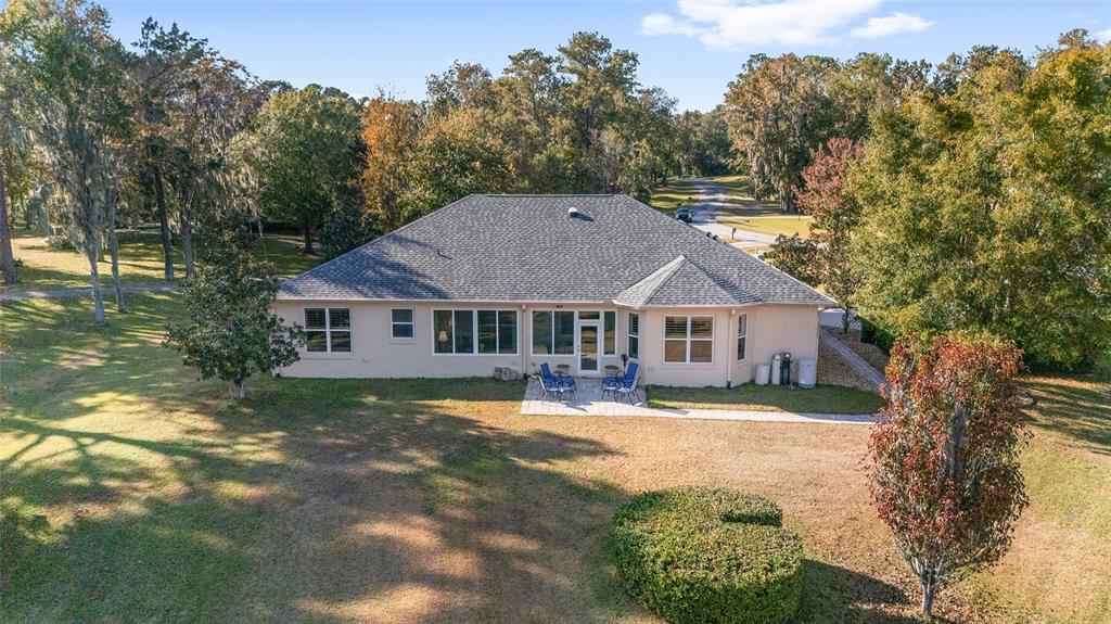8942 Southwest 8th Street Ocala, FL 34481 - Photo 5 of 59 a view of a house with a yard