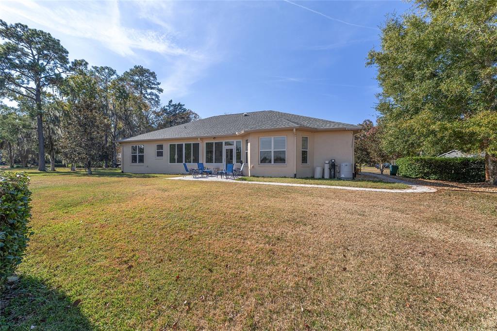 8942 Southwest 8th Street Ocala, FL 34481 - Photo 56 of 59 a view of house with a yard