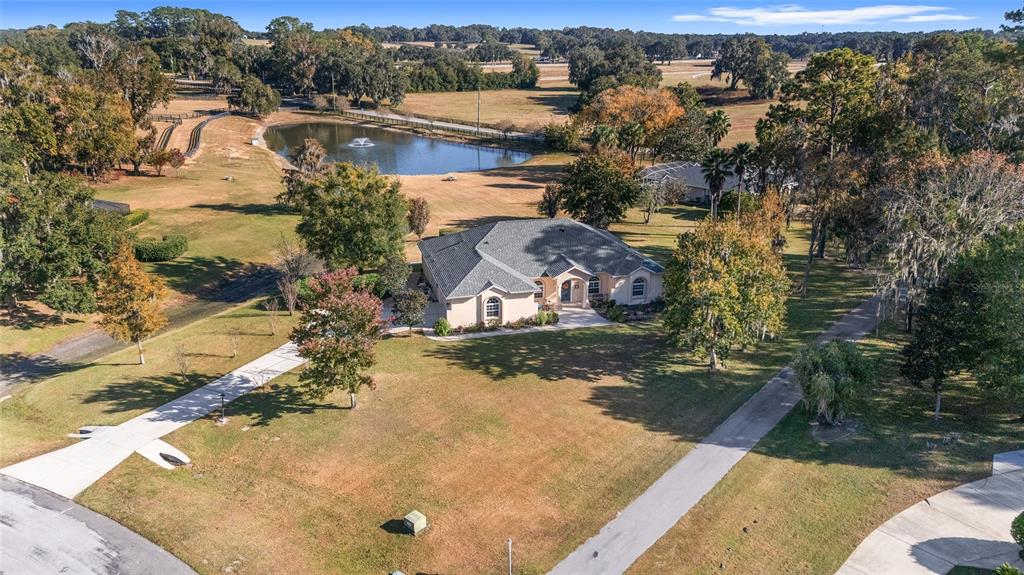 8942 Southwest 8th Street Ocala, FL 34481 - Photo 57 of 59 an aerial view of residential houses with outdoor space